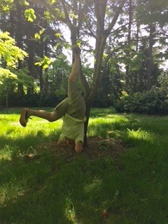 Yes, our chef gone upside down in headstand! (photo by Leslie S)